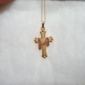 14k gold cross with rose gold shroud